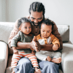 black dad with twins